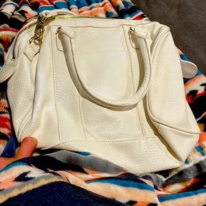 A brand new handbag and over the shoulder
